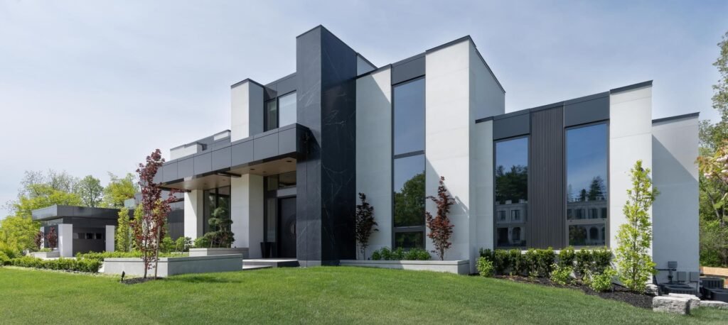 Modern home utilizing vedrex woodgrain aluminum cladding systems and soffit systems