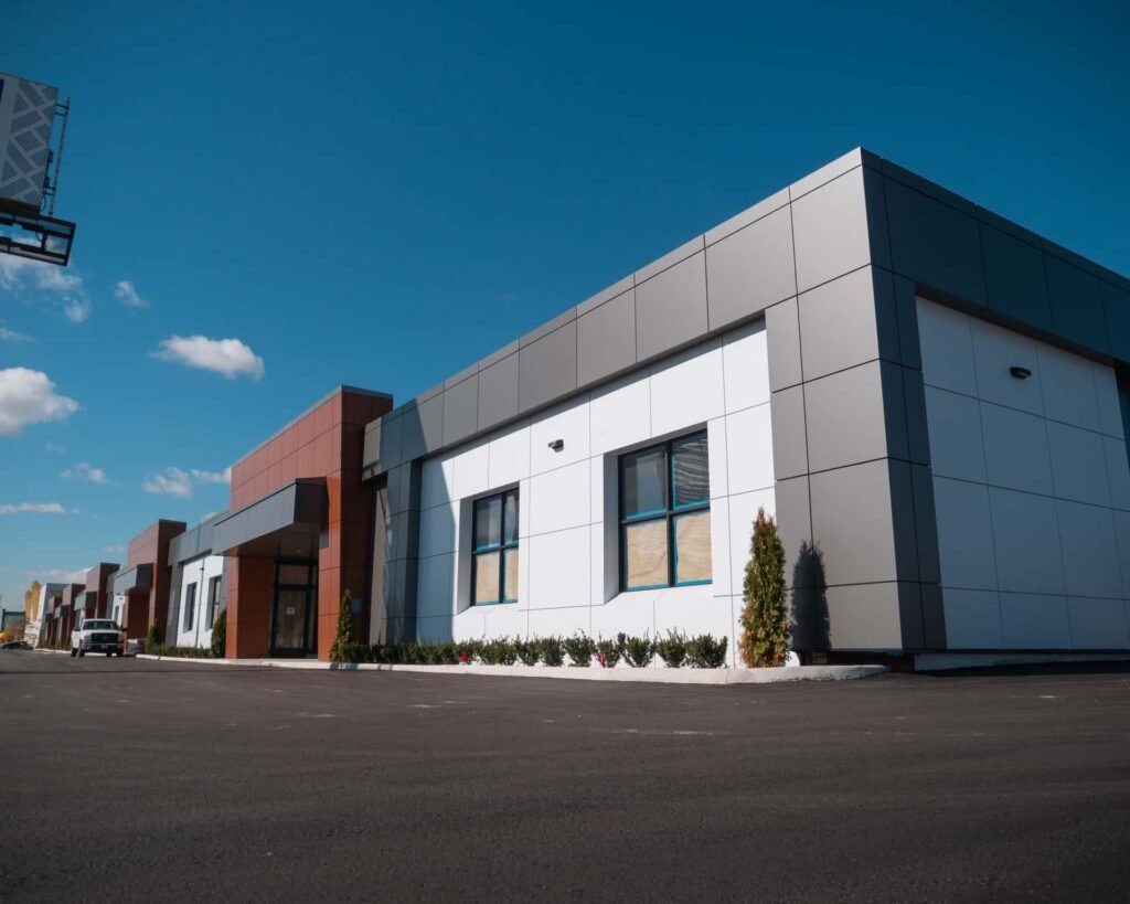 Commercial building utilizing vedrex woodgrain aluminum cladding systems and soffit systems