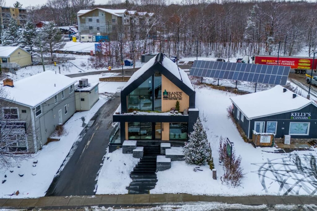 Commercial building utilizing vedrex woodgrain aluminum cladding systems and soffit systems
