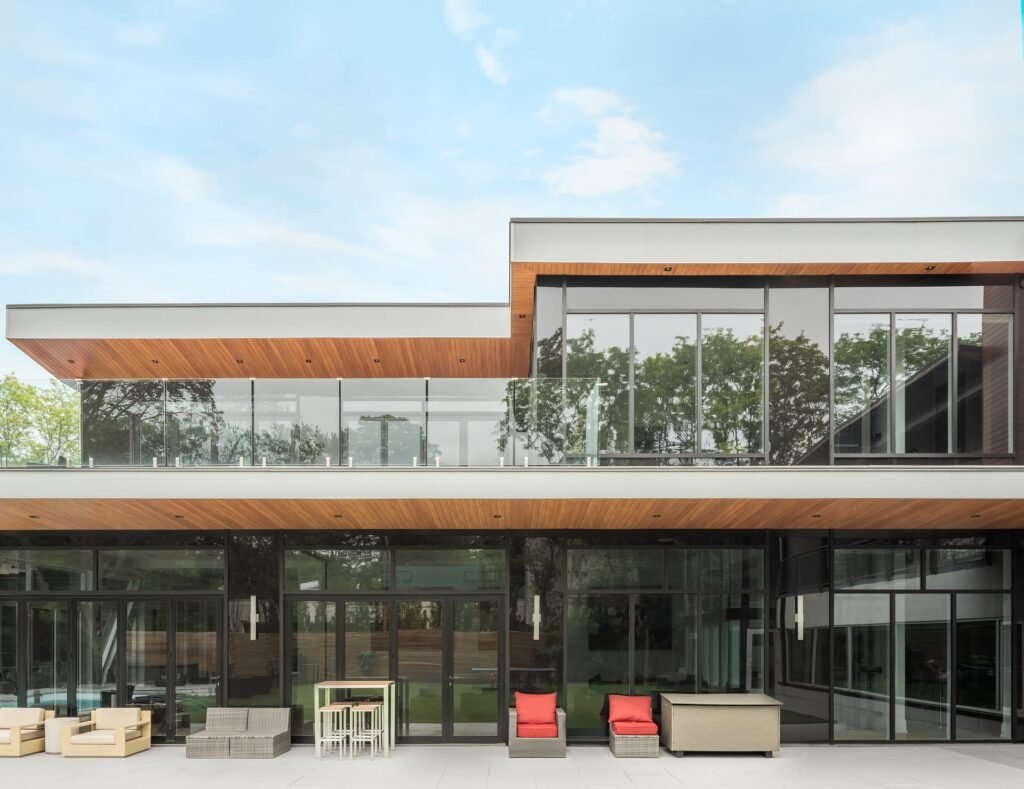 Modern home utilizing vedrex woodgrain aluminum cladding systems and soffit systems