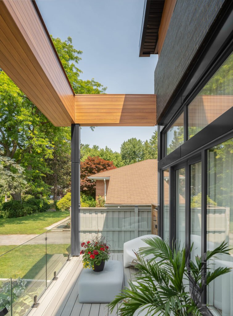 Modern home utilizing vedrex woodgrain aluminum cladding systems and soffit systems