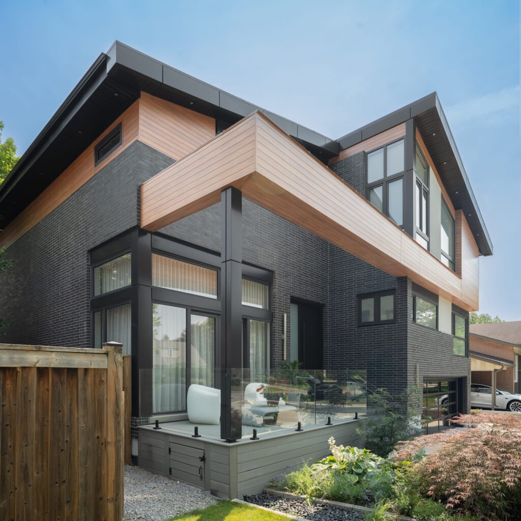 Modern home utilizing vedrex woodgrain aluminum cladding systems and soffit systems