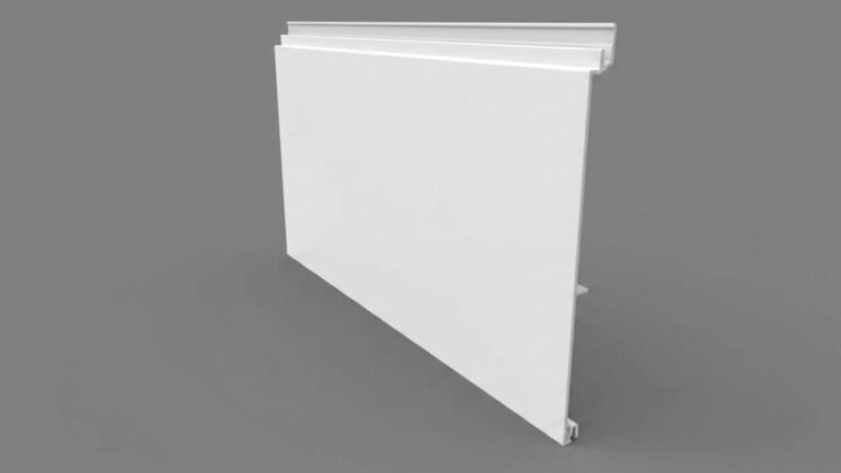 A piece of white aluminum siding profile displayed at an angle against a solid gray background.